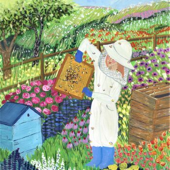 A beekeeper collects her honey from the apiary in her garden as the bees’ buzz around