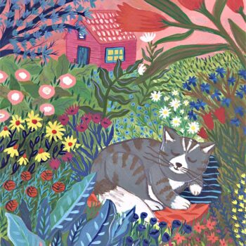 Cat sleeping in the plants